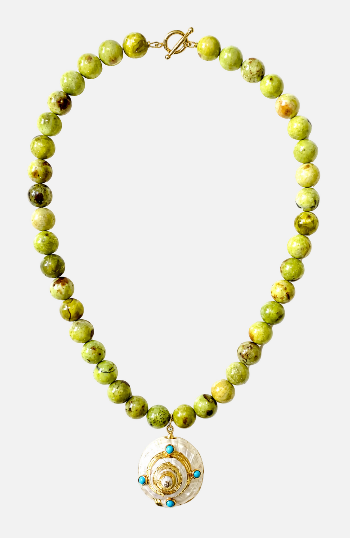 Green beaded necklace with a gold and turquoise pendant on a white background