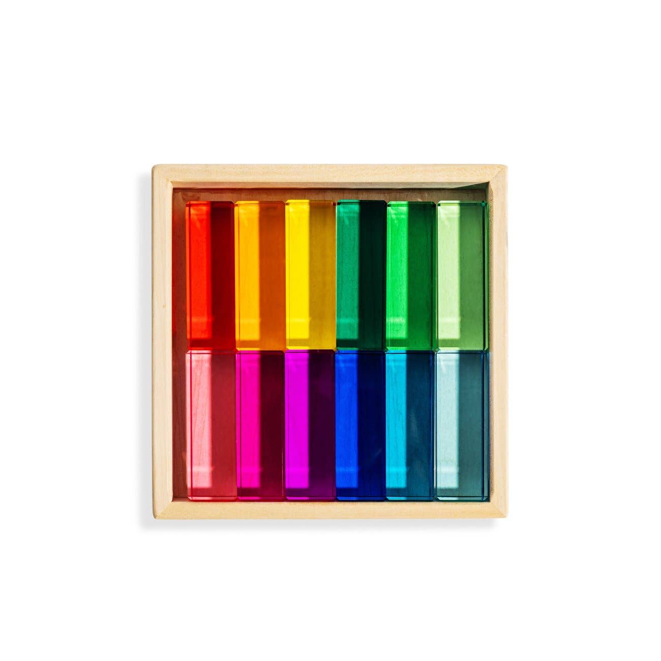 colorful acrylic blocks in a wooden tray
