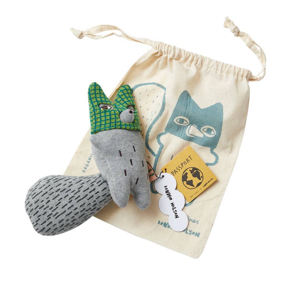 Plush toy resembling a cat with a drawstring bag featuring a cat design on a white background