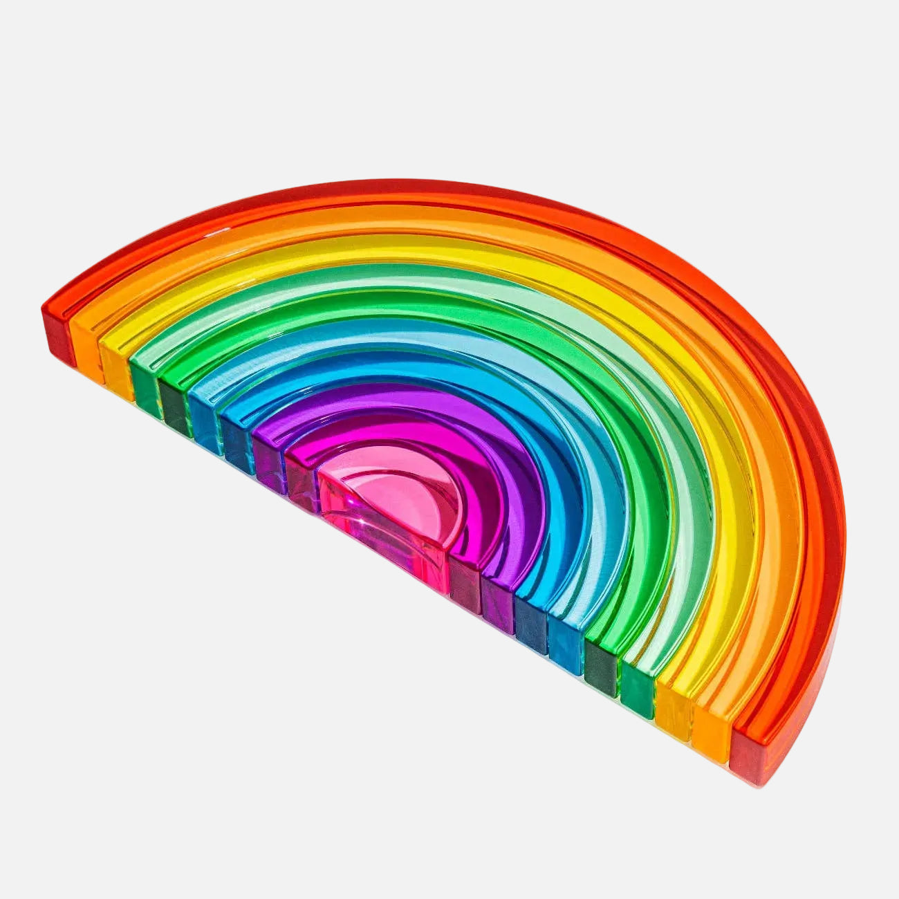 Colorful rainbow-shaped object on a white background