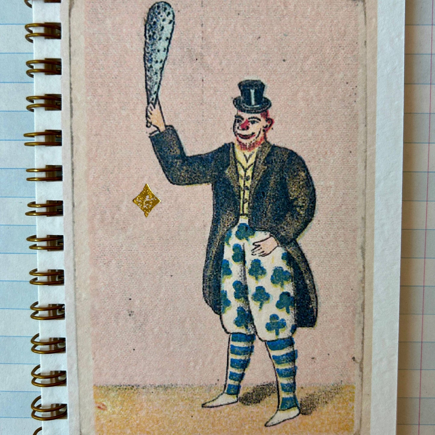 Notebook with a vintage-style illustration of a clown on the cover