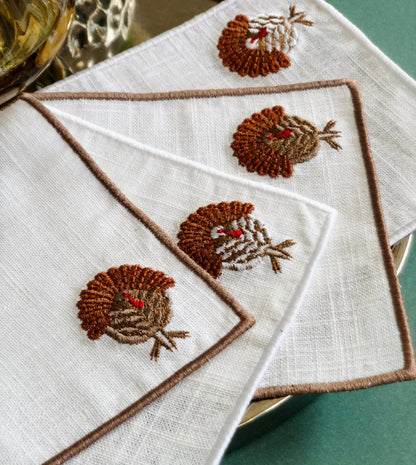 Set of 4 Thanksgiving Embroidered Turkey Cocktail Napkins: Light brown hem
