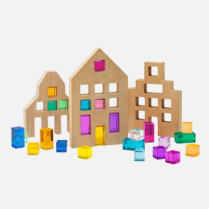 Wooden building blocks with colorful transparent inserts on a white background