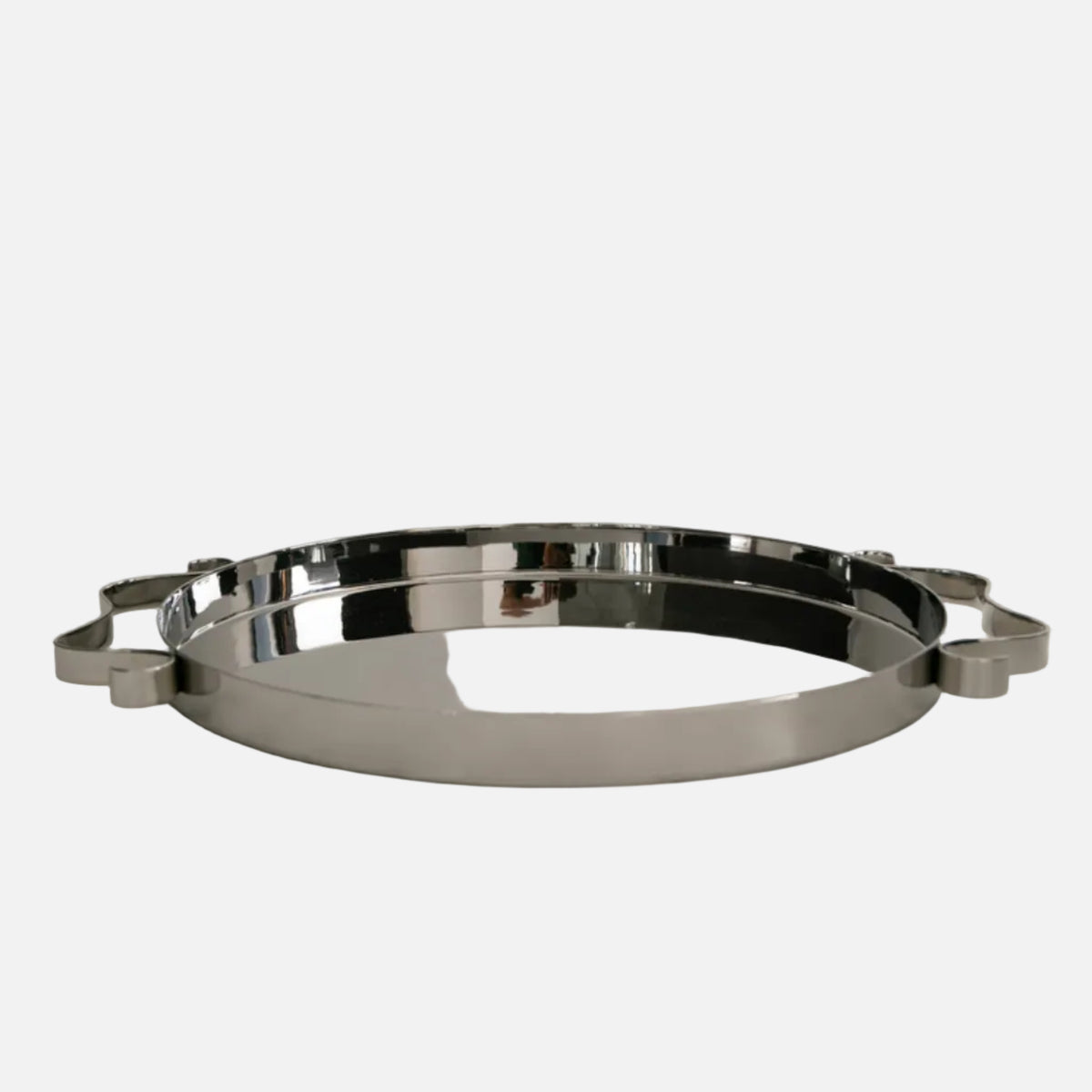 Silver decorative tray on a light gray background