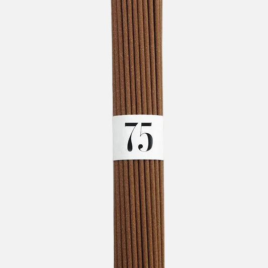 Pack of brown sticks with a white label displaying the number 75 on a white background
